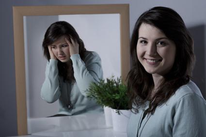 girl in mirror with bipolar