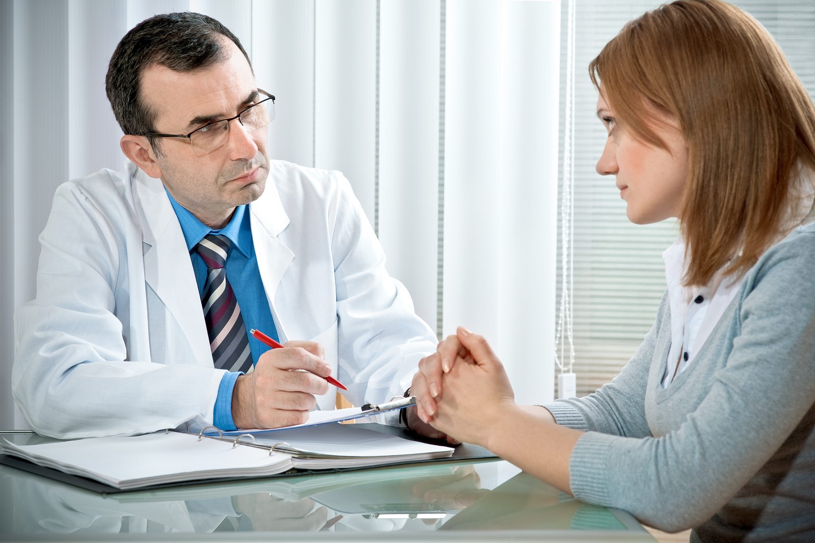 young woman in a conversation with a consultant or psychologist