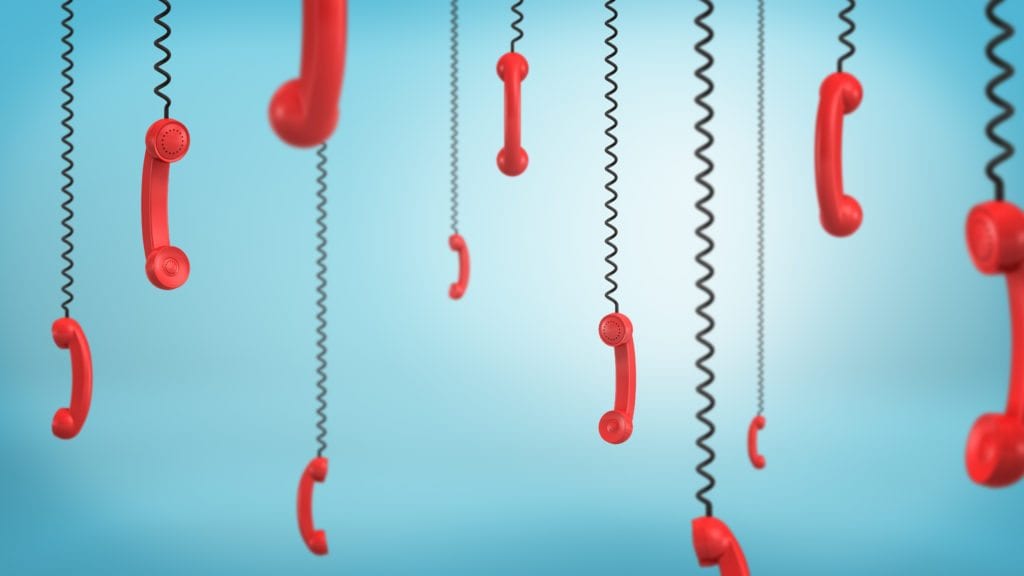 3d rendering of red retro phone receivers hang down from black cords on a blue background. Business and communication. Emergency number. Customer's support.