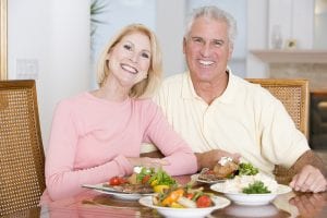 Elderly Couple Enjoying Healthy Meal, Mealtime Together