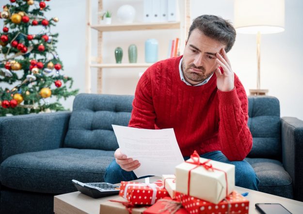 man stressed during the holiday season