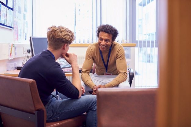 College Student Meeting with Advisor