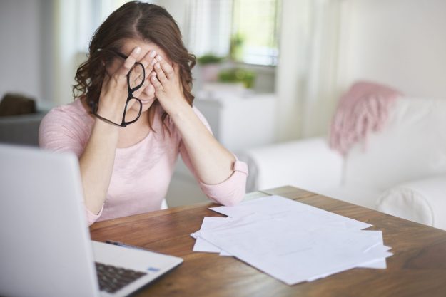 Woman is stressed about her finances