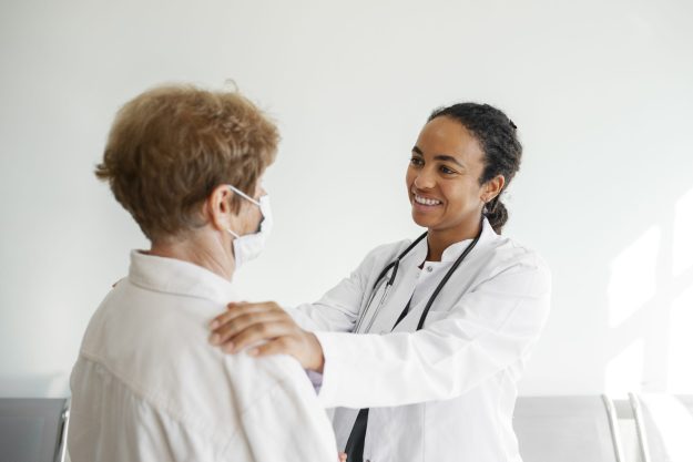 Doctor talks to patient about participating in clinical trial